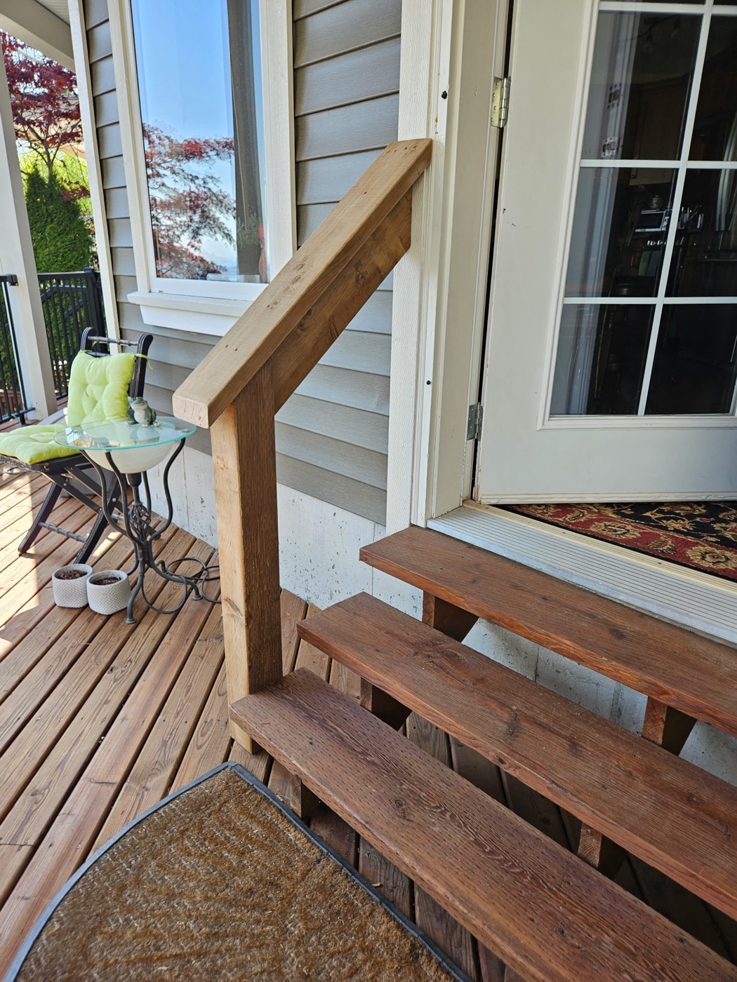 Custom cedar deck with hand-built stairs, posts and railing