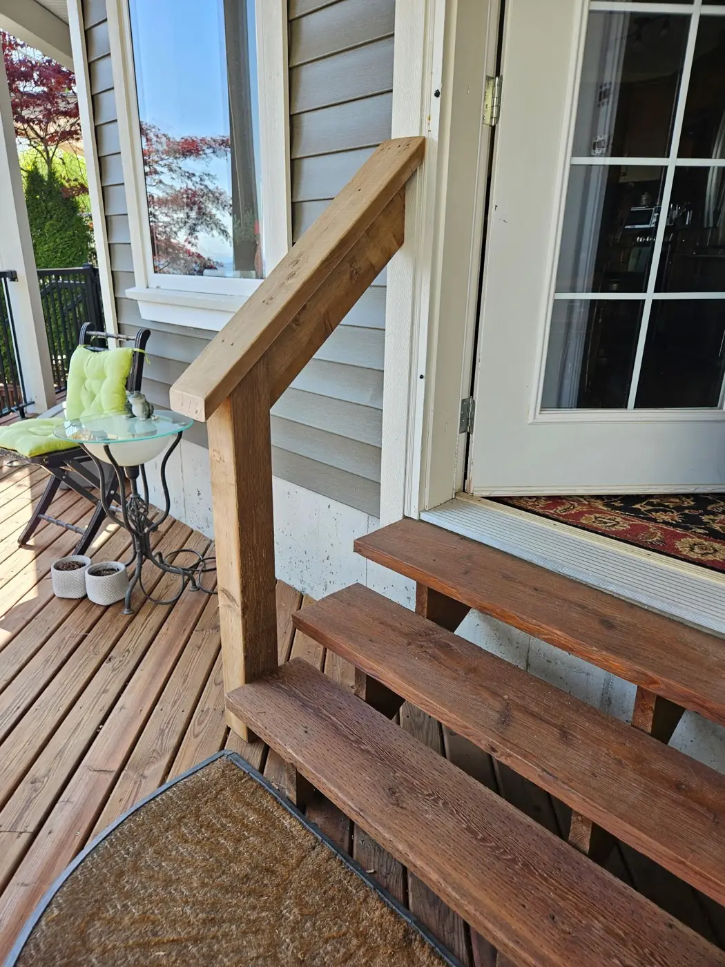 Cedar deck with exterior stairs, posts and railing